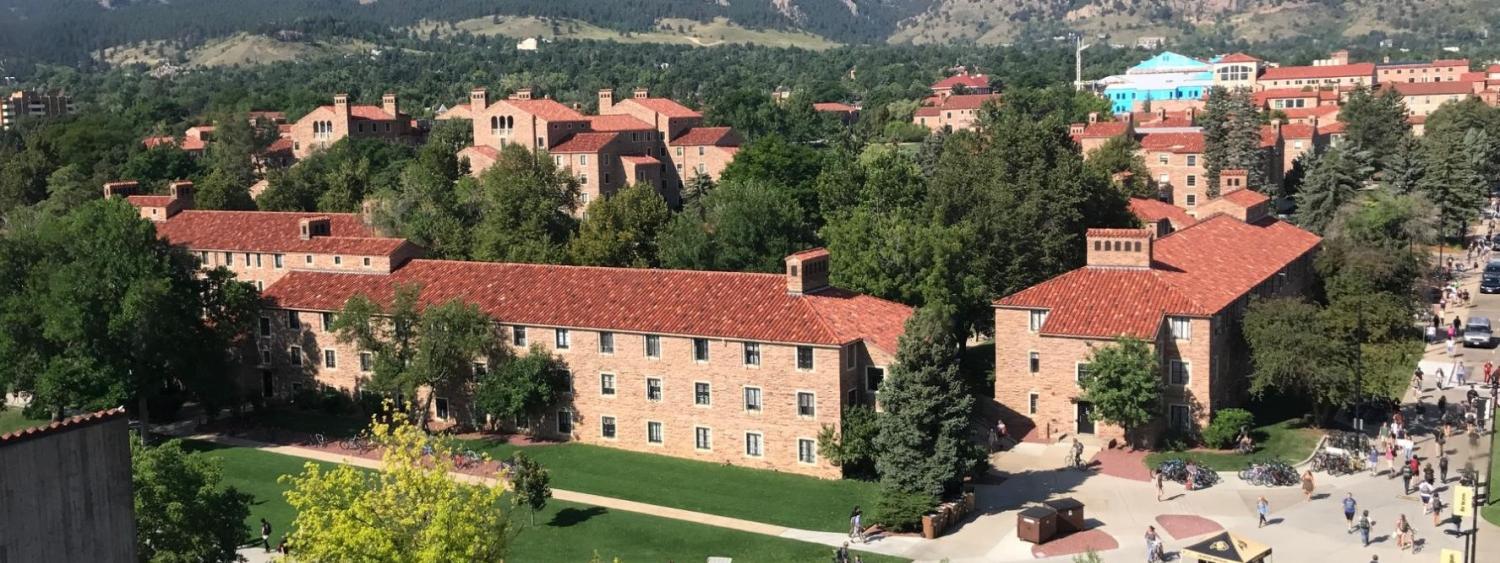 An image of the University of Colorado campus from overhead with the Flatirons in the background