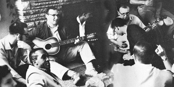 students listening to guitar