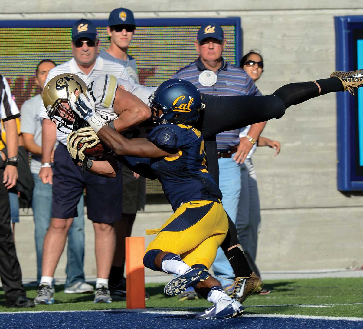 Nelson Spruce catching football