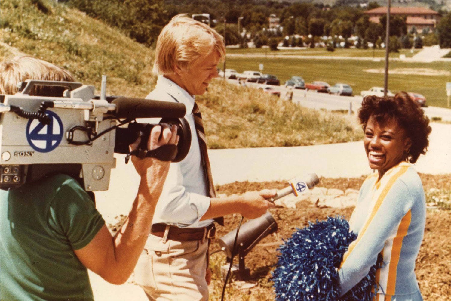 Cheerleader Lorna Tate being interviewed