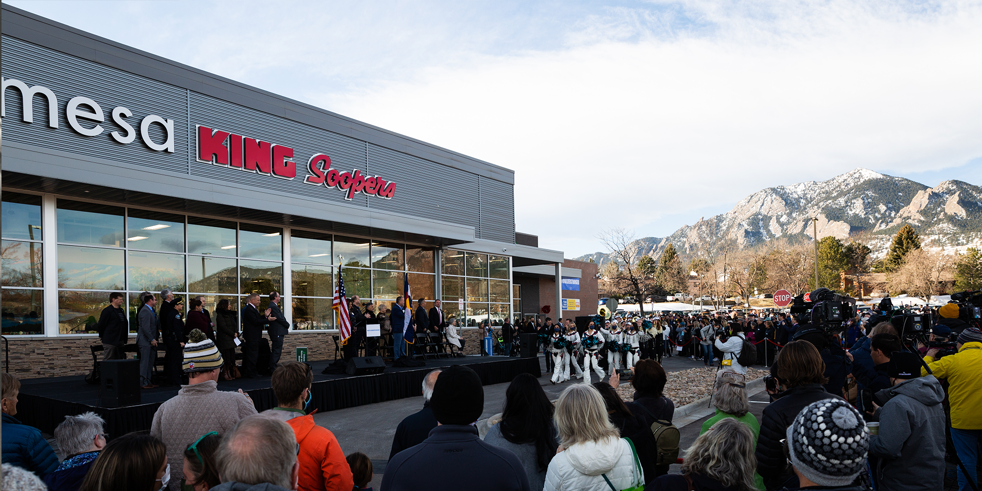 A ceremony takes place outside Table Mesa's King Soopers.