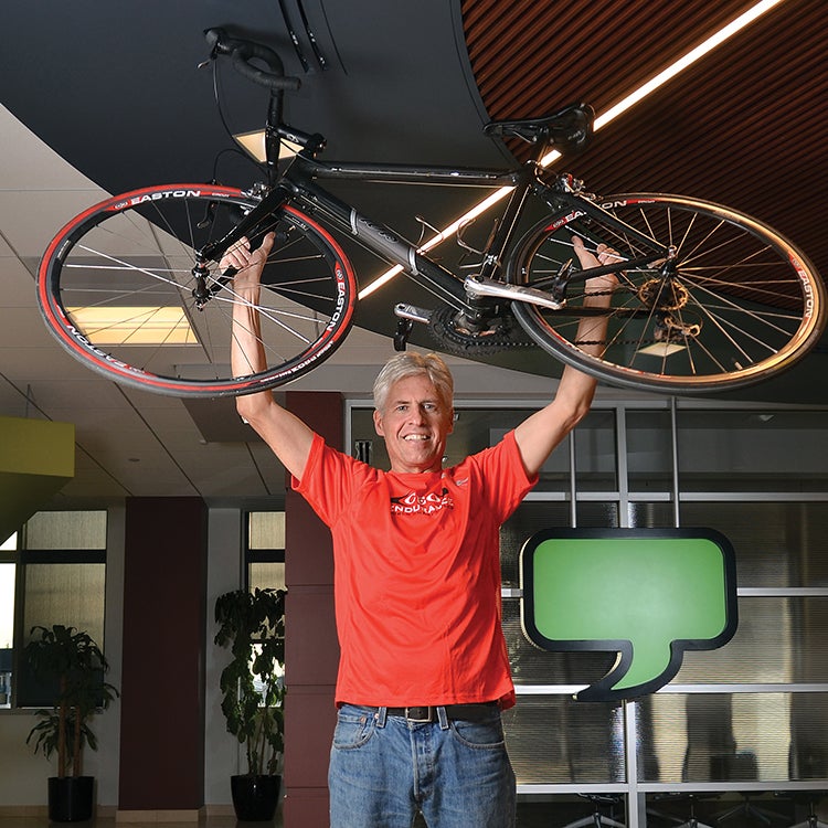 Dan King holding a bike