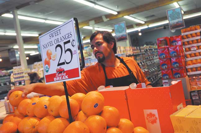 worker stocking shelves