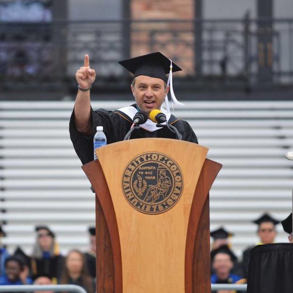 Eric Stough speaking during spring commencement