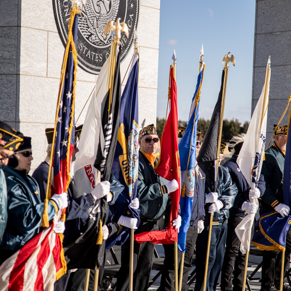 color guard holding military flags
