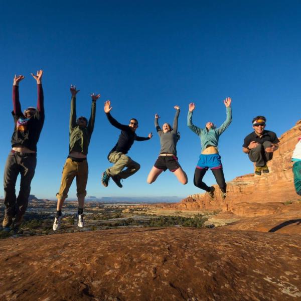 Members of the CU Hiking Club jump for joy