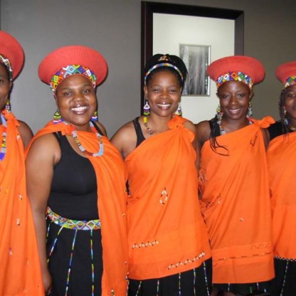group of brightly dressed musicians