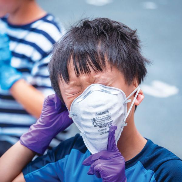 Child in mask at CU