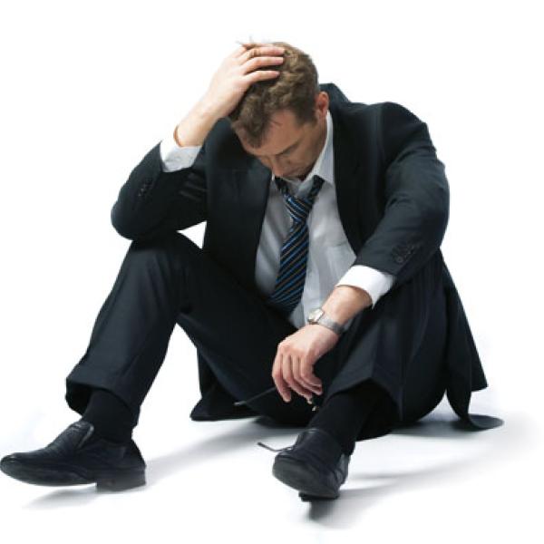 seated sad man