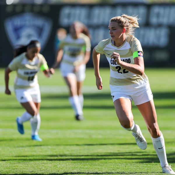 Taylor playing soccer