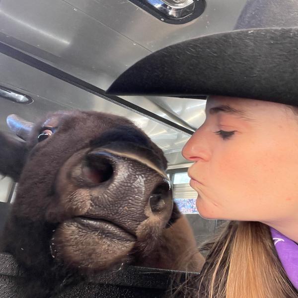 Selfie with Ralphie the buffalo and her handler