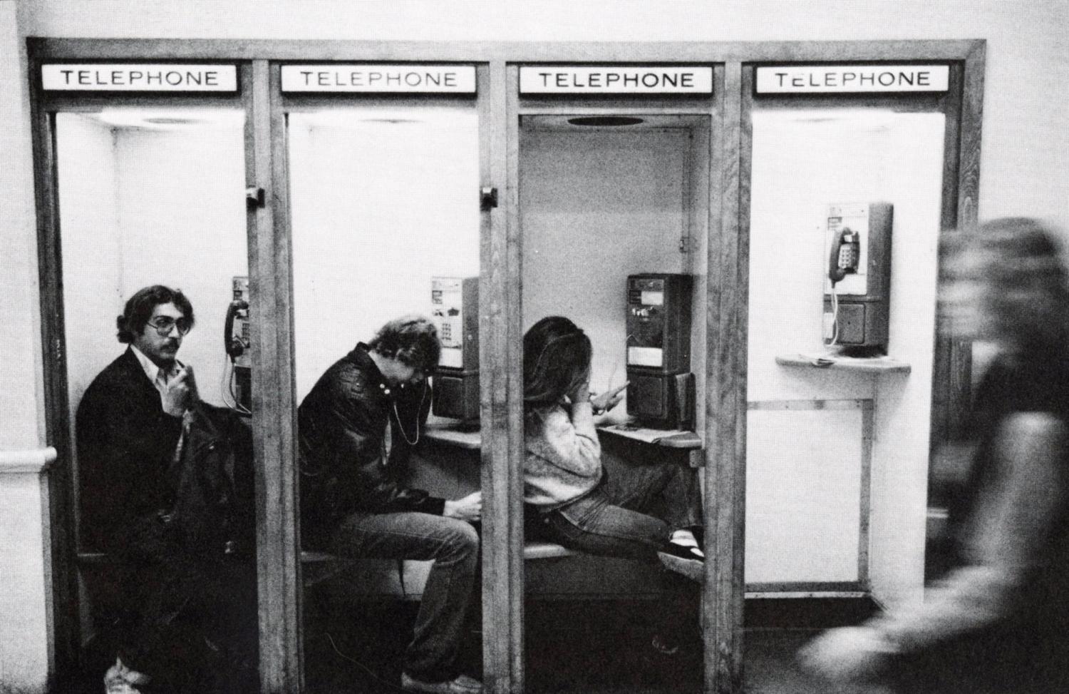 Students at a phone booth