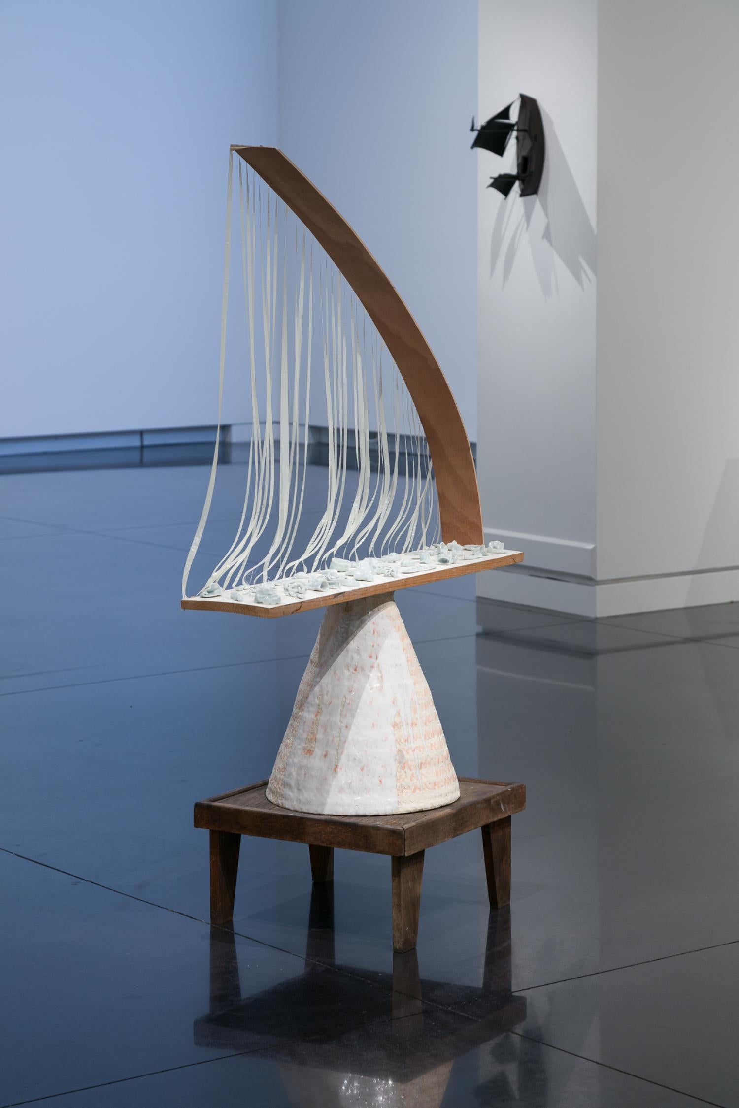 “sailing bare breasted with a gun” art piece