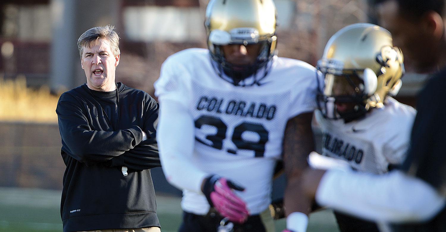 CU Buffs coach and players