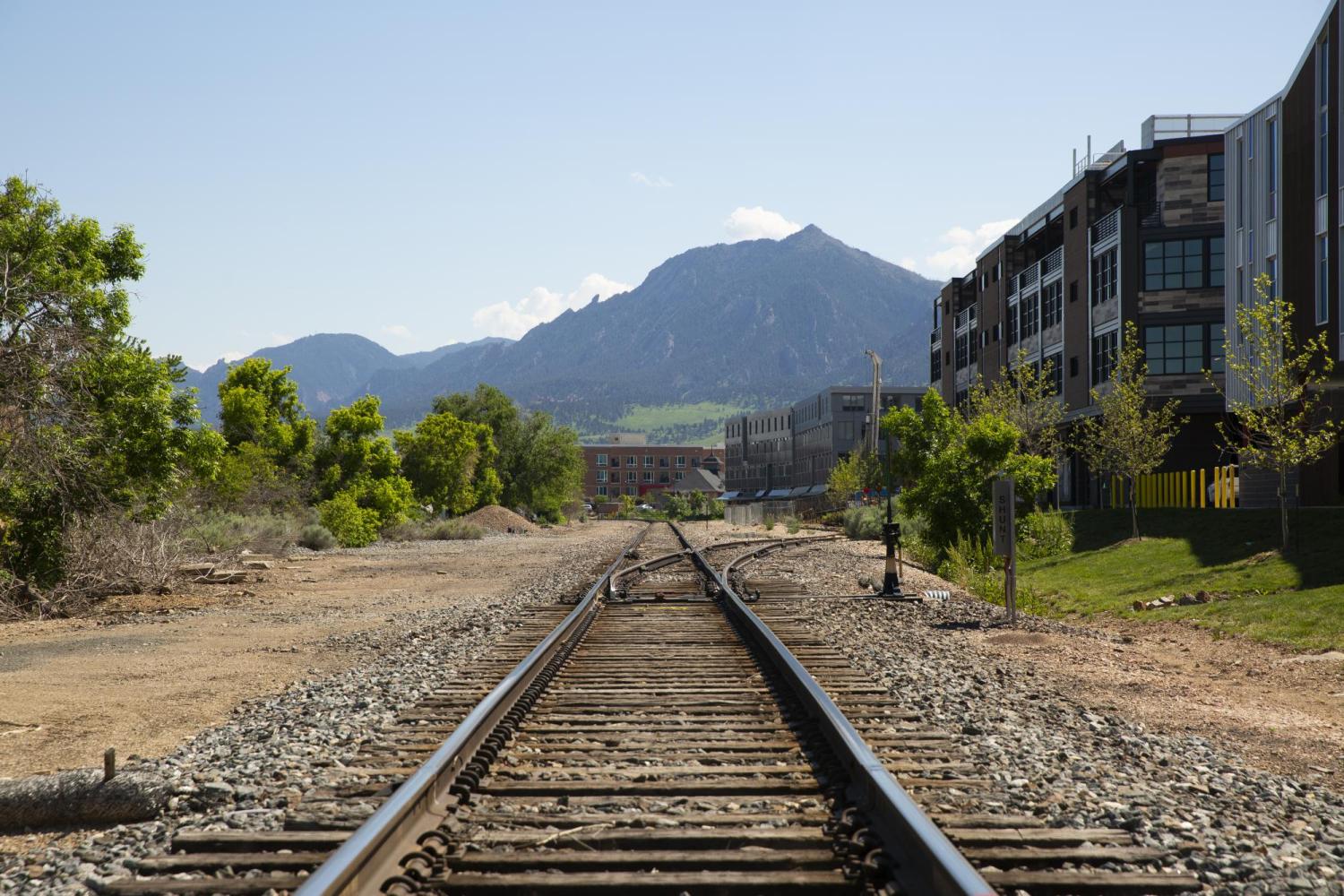 Train track with Flatirons in background