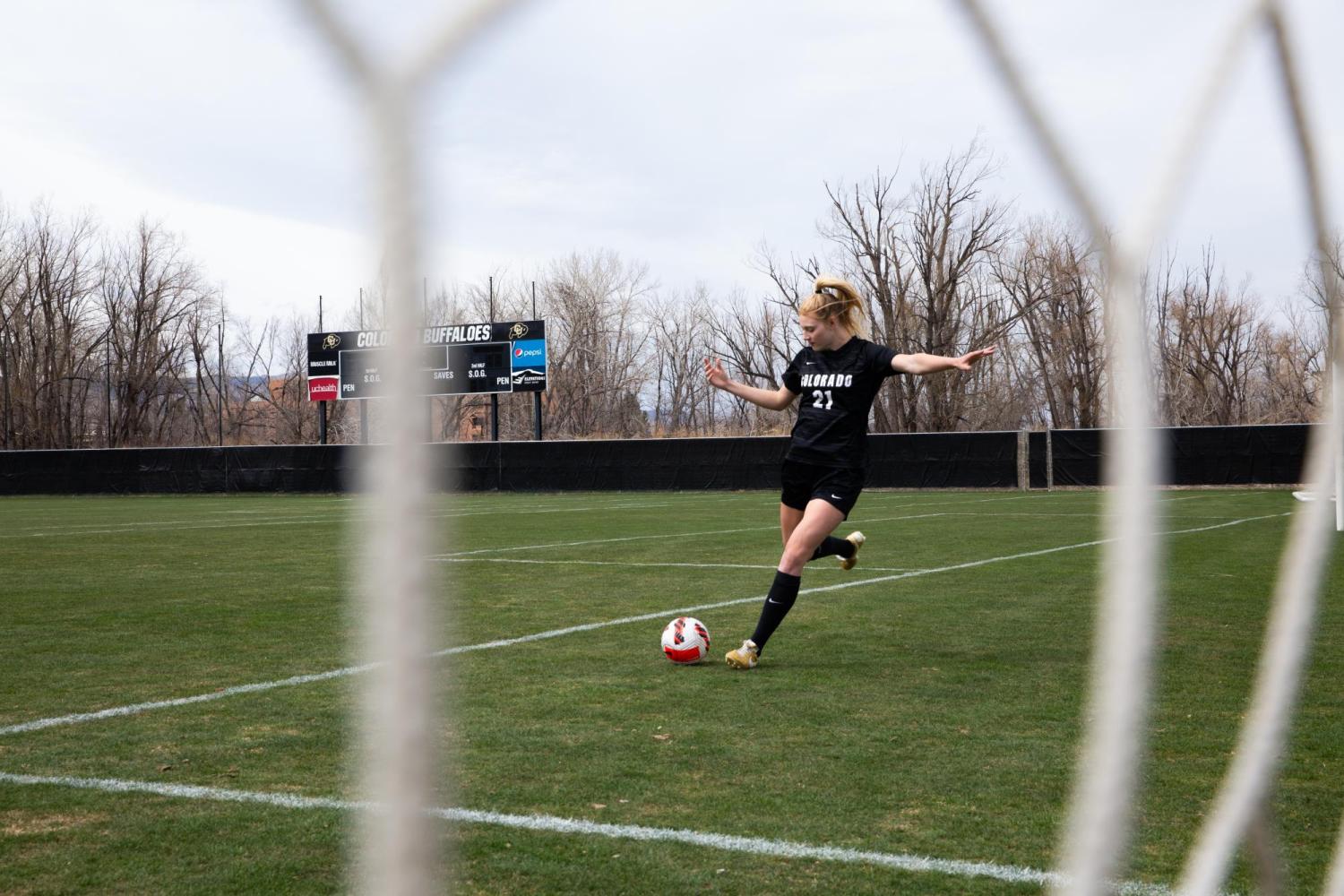 Hannah Sharts taking a shot on goal.