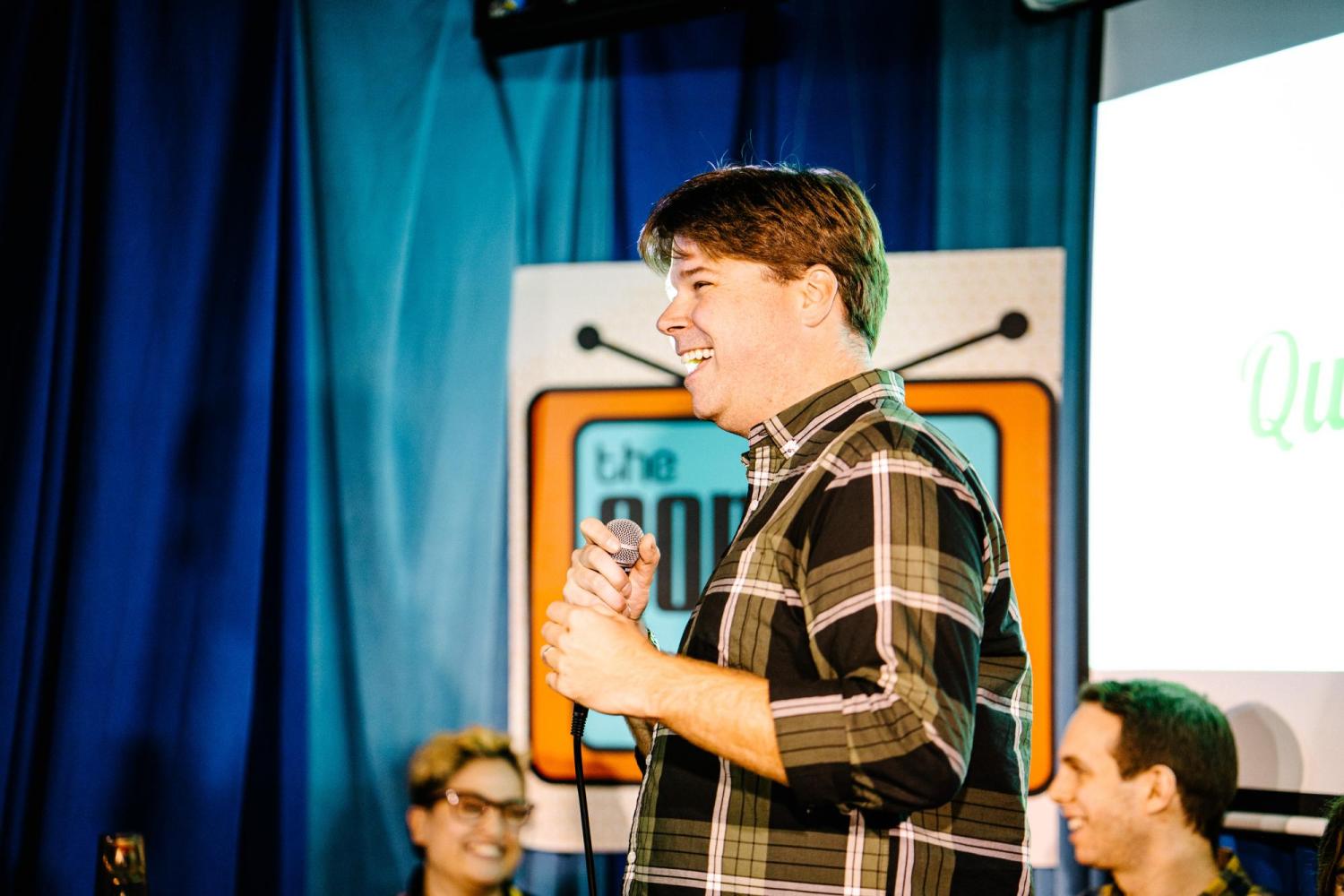 Brad Turner directing a live taping of a podcast