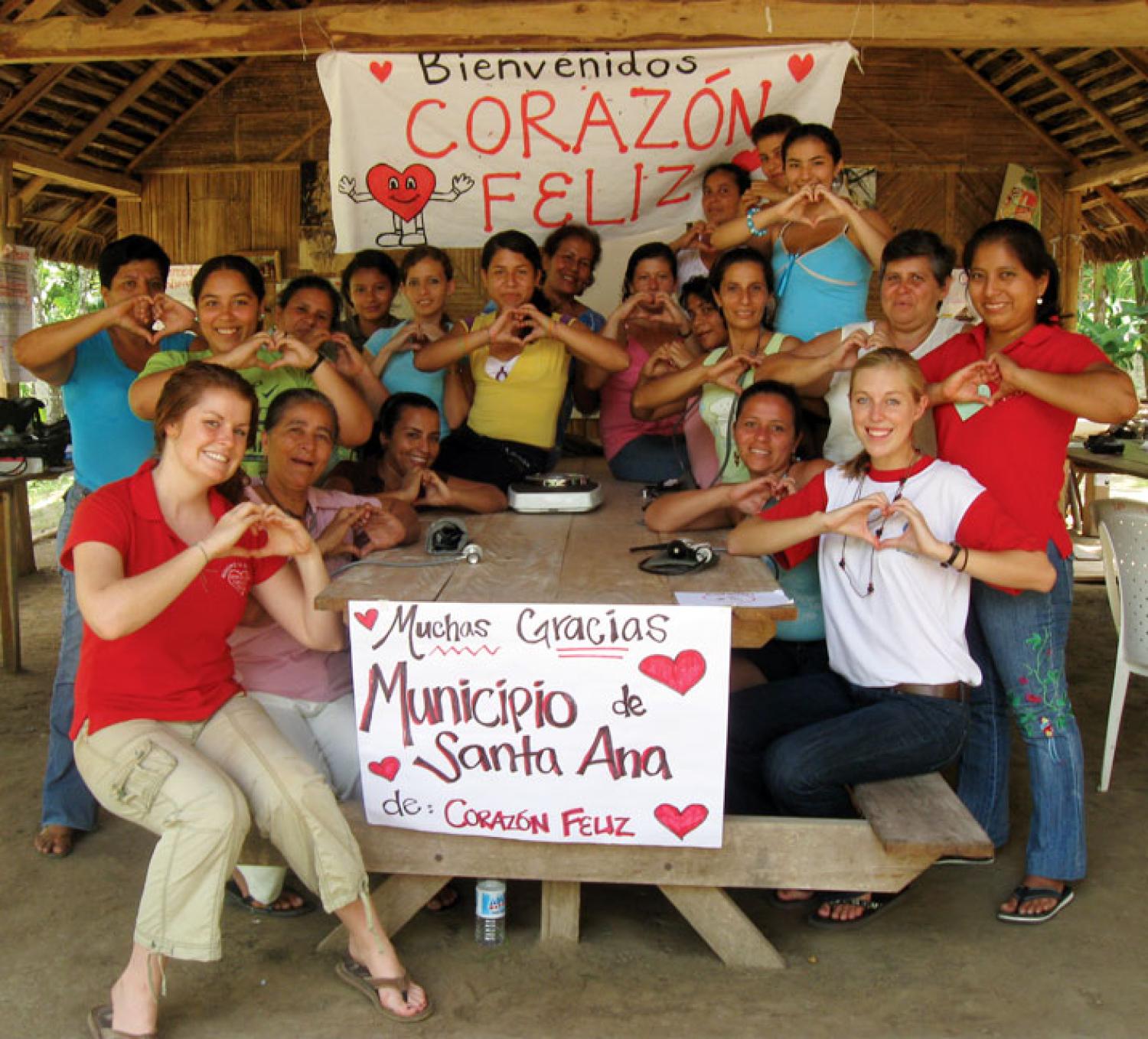 CU peace corps group photo with children