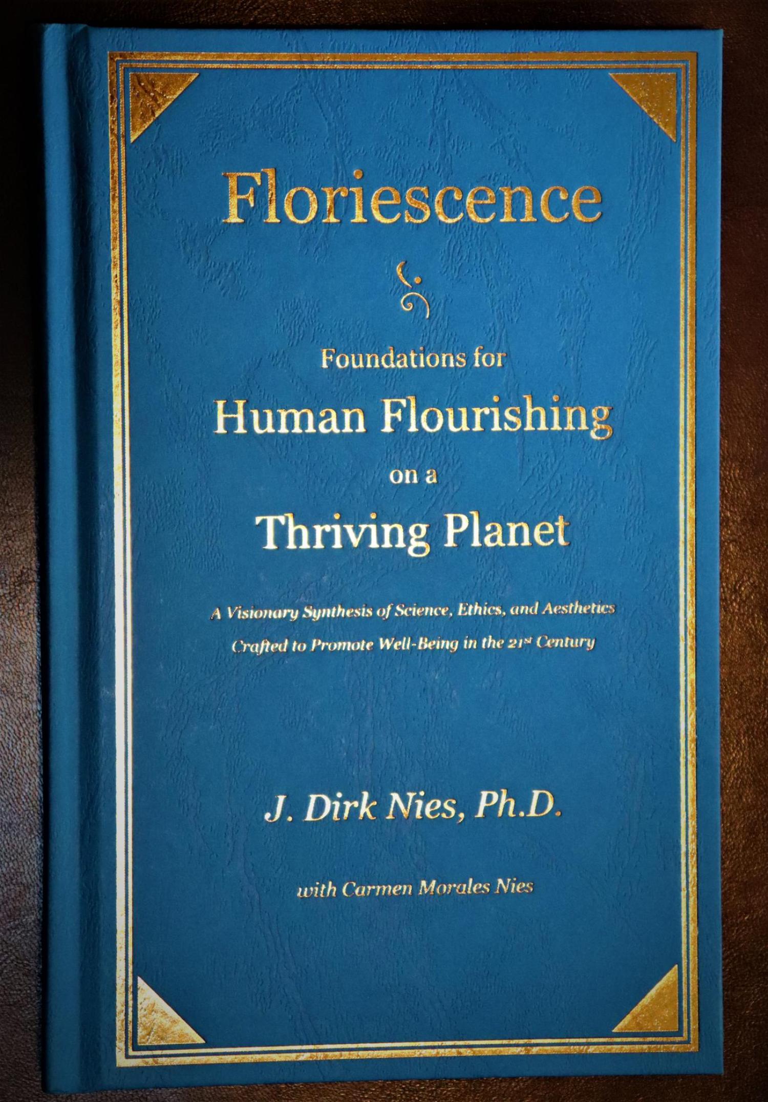Floriescence cover; blue with gold lettering