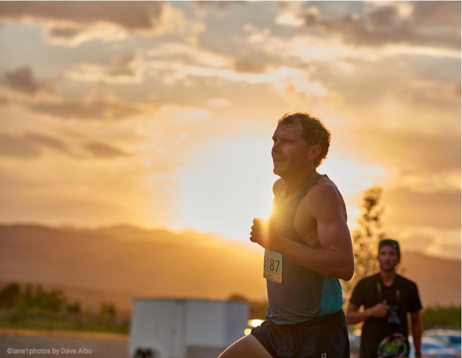 Jake Riley runs while the sun sets.