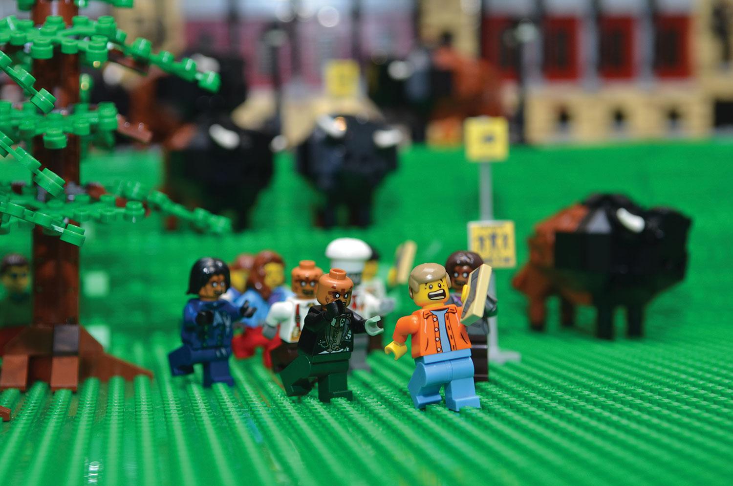 LEGO crowd running near buffalo