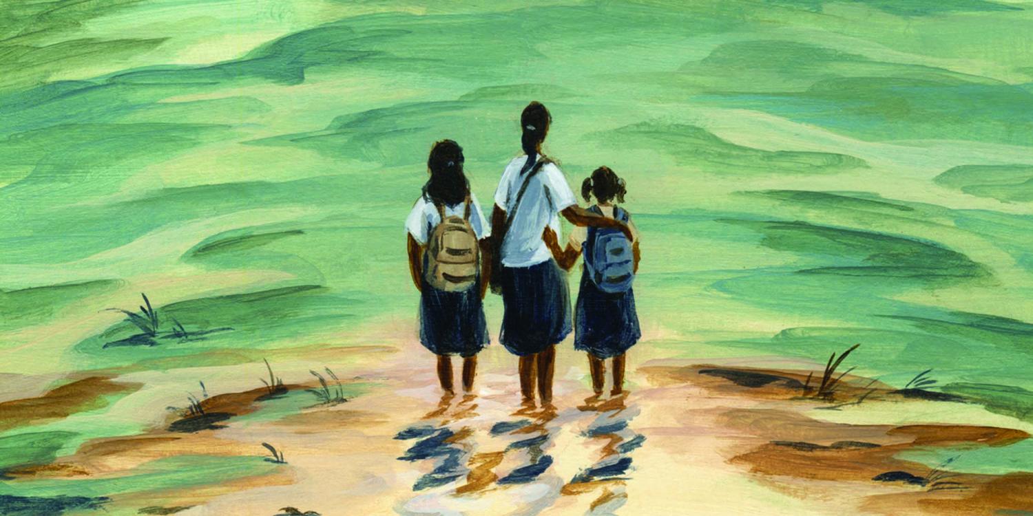 three young people standing in ankle-deep water