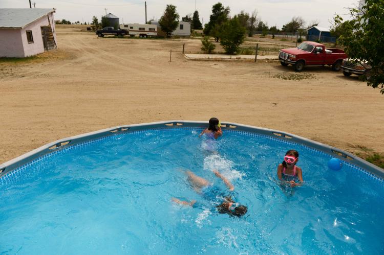 Children playing in a pool