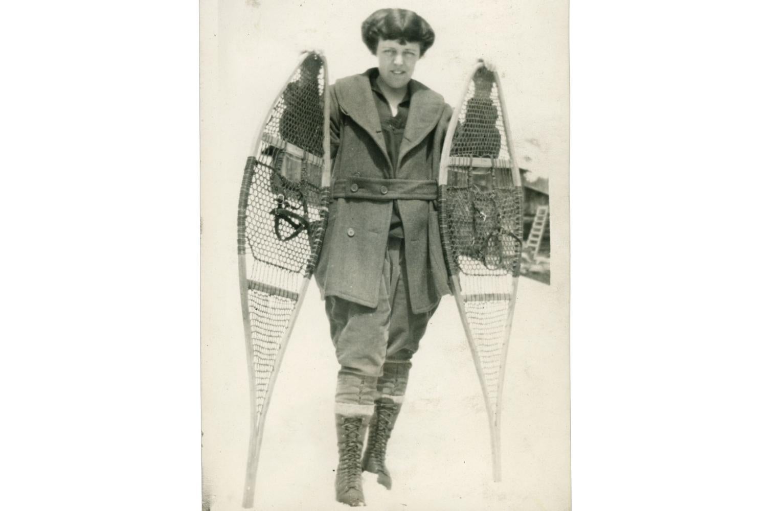 A Hiking Club member, circa 1919, snowshoeing
