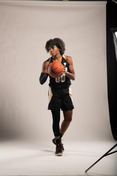 Jaylyn Sherrod holding basketball