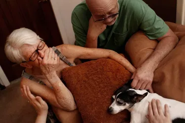 Old couple with their dog