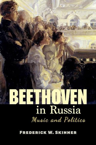 The cover is mostly black with images of people on the left side looking at something that is not pictured. The people are in a theatre and below them is the title: Beethoven in Russia: Music and Politics