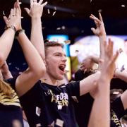 Ted Chalfen cheering on the Buffs with the C-Unit student section.