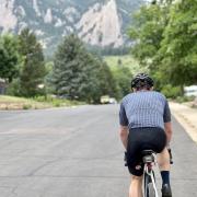 A cyclist near the flatirons