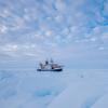 a boat in arctic ice