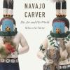 The cover is white with traditional Native American carvings featured. 