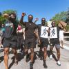 K.D. Nixon, Chris Miller, Laviska Shenault Jr. and Mckinley Wright IV protesting