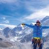 Kimberly Hess on top of a mountain