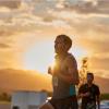 Jake Riley runs as the sun sets.