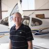 Jim Voss in front of his airplane