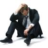 seated sad man