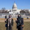 Students Zahra Abdulameer and Shay Mannik pose in front of the Capital building.