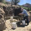 Paleontologist Rick Hunter excavates the skeleton.