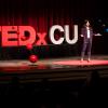 Nina Williams rehearses her presentation on the TEDxCU stage.