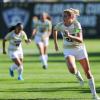 Taylor playing soccer