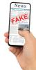 Image of mobile phone with FAKE NEWS stamp