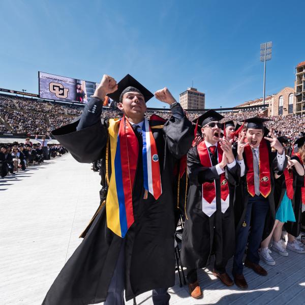 Students cheering at the commencement ceremony