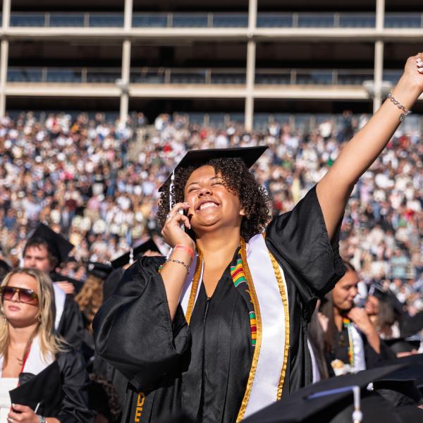 Student celebrating at the commencement ceremony