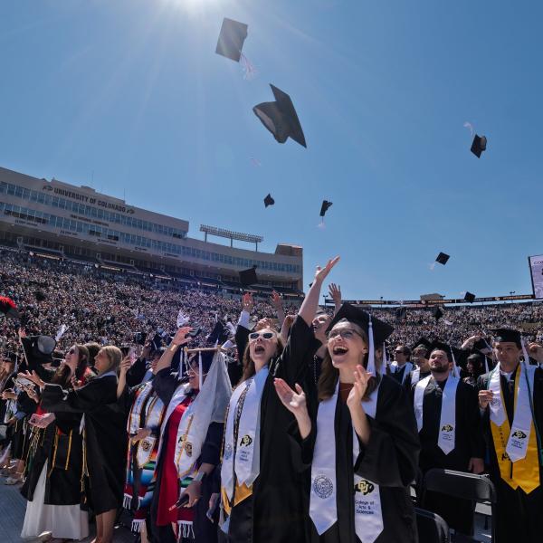 Students throwing their caps at the commencement ceremony