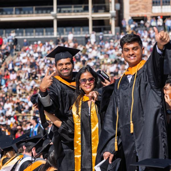 Students posing for a picture at the commencement ceremony