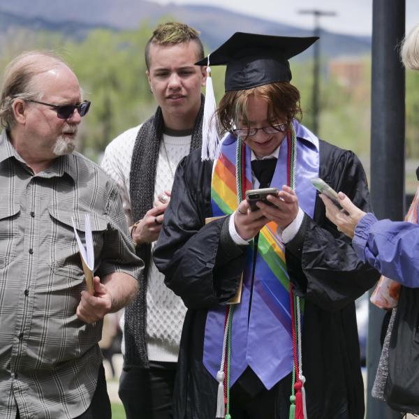 A graduate with their family.